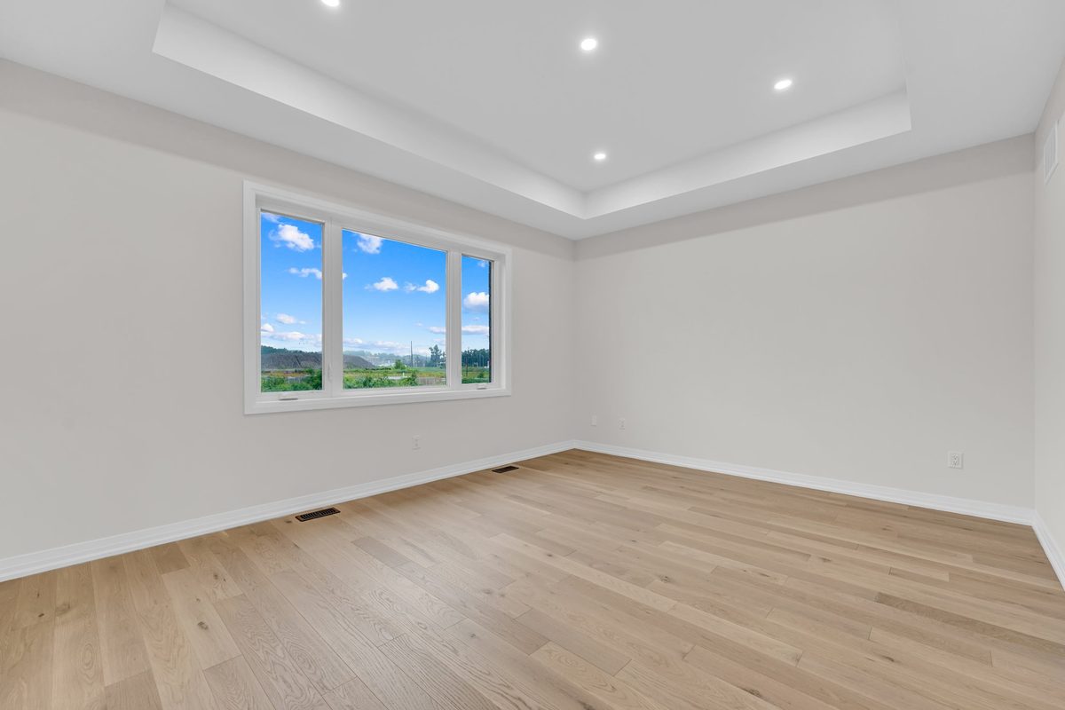 Primary bedroom before staging